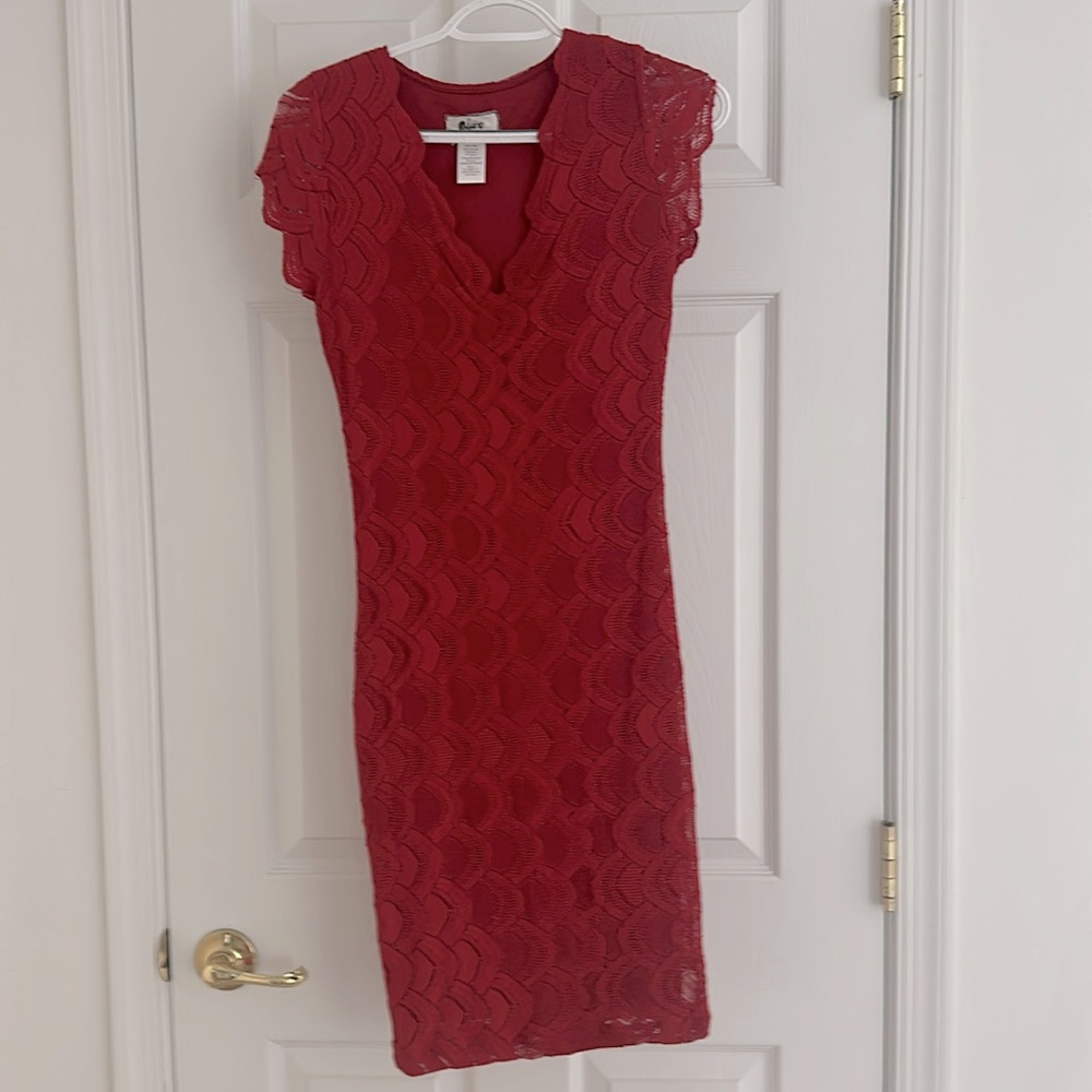 Crimson red lined lace dress. Fitting but with good stretch
